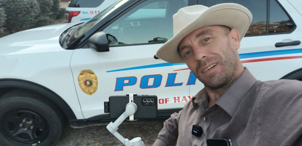 Don Matthews working in the field as a journalist